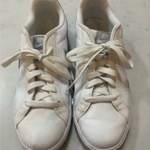 Women’s white Nikes with a silver swoosh exclusive from J.Crew size 9